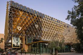 Image of The University of Western Australia's E-Zone Building against a dusty sun setting sky